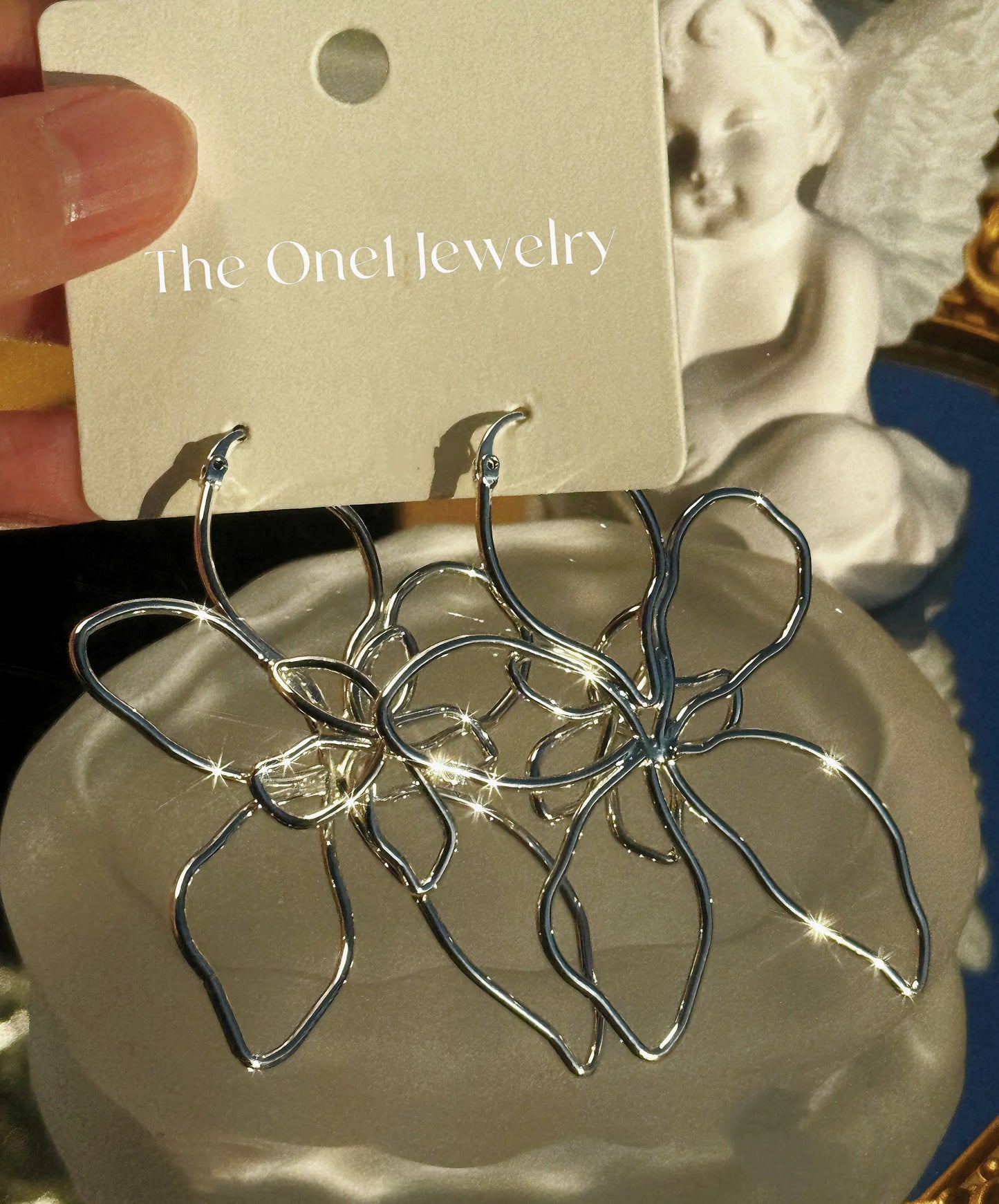 The One1- Silver Flower Statement Earrings